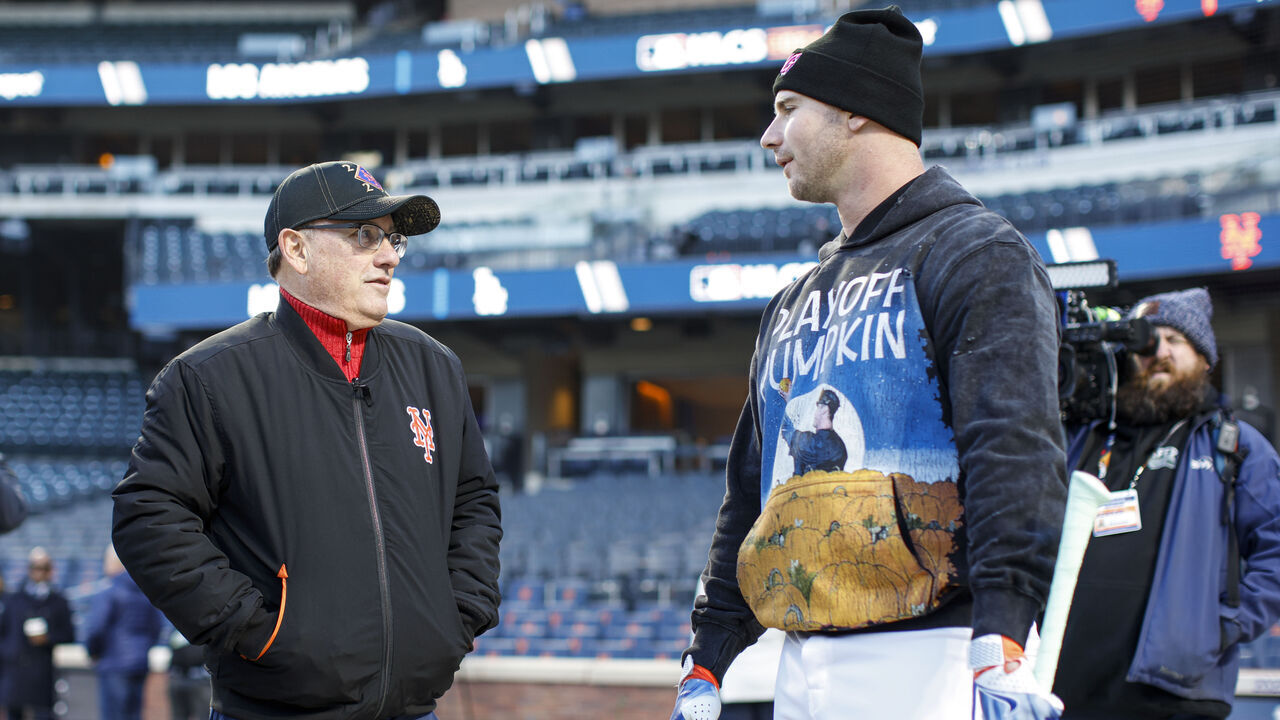 NEW YORK, NY - OCTOBER 16: Owner Steven A. Cohen and Pete Alonso #20 of the New York Mets interact prior to Game 3 of the NLCS presented by loanDepot between the Los Angeles Dodgers and the New York Mets at Citi Field on Wednesday, October 16, 2024 in New York, New York.