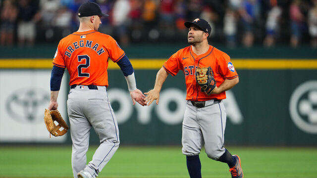 ARLINGTON, TX - AUGUST 07: Alex Bregman #2 of the Houston Astros celebrates with Jose Altuve #27 after defeating the Texas Rangers at Globe Life Field on Wednesday, August 7, 2024 in Arlington, Texas.