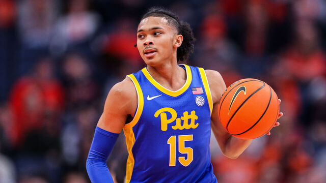 SYRACUSE, NEW YORK - JANUARY 25: Jaland Lowe #15 of the Pittsburgh Panthers dribbles the ball during the first half against the Syracuse Orange at JMA Wireless Dome on January 25, 2025 in Syracuse, New York.