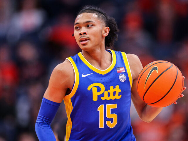 SYRACUSE, NEW YORK - JANUARY 25: Jaland Lowe #15 of the Pittsburgh Panthers dribbles the ball during the first half against the Syracuse Orange at JMA Wireless Dome on January 25, 2025 in Syracuse, New York.