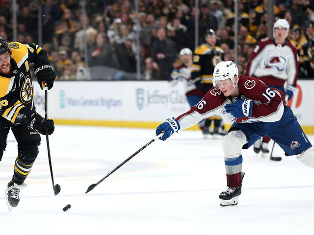 BOSTON, MASSACHUSETTS - JANUARY 25: David Pastrnak #88 of the Boston Bruins takes a shot to score against Juuso Parssinen #16 of the Colorado Avalanche during the third period at TD Garden on January 25, 2025 in Boston, Massachusetts. The Bruins defeat the Avalanche 3-1.