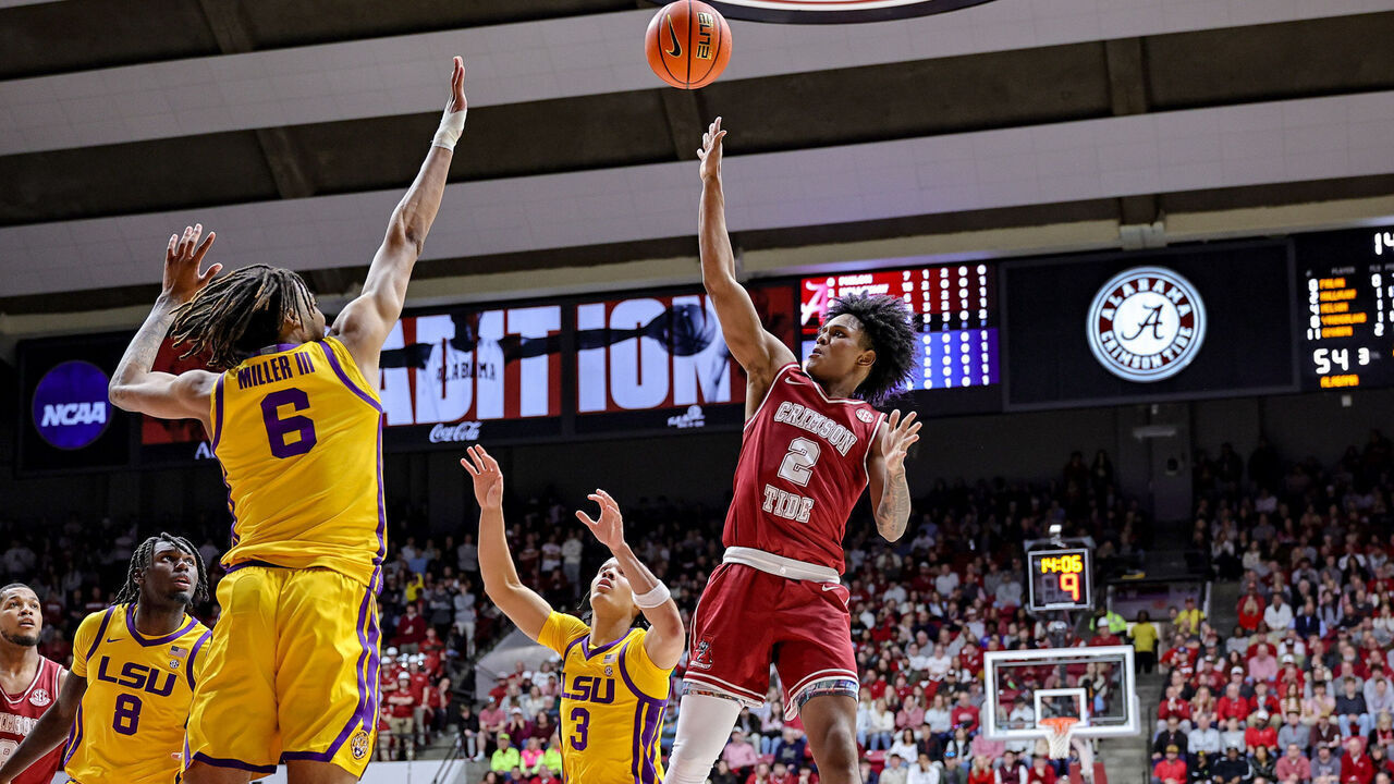 TUSCALOOSA, ALABAMA - JANUARY 25: Aden Holloway #2 of the Alabama Crimson Tide puts up a second half shot over Robert Miller III #6 of the LSU Tigers at Coleman Coliseum on January 25, 2025 in Tuscaloosa, Alabama.