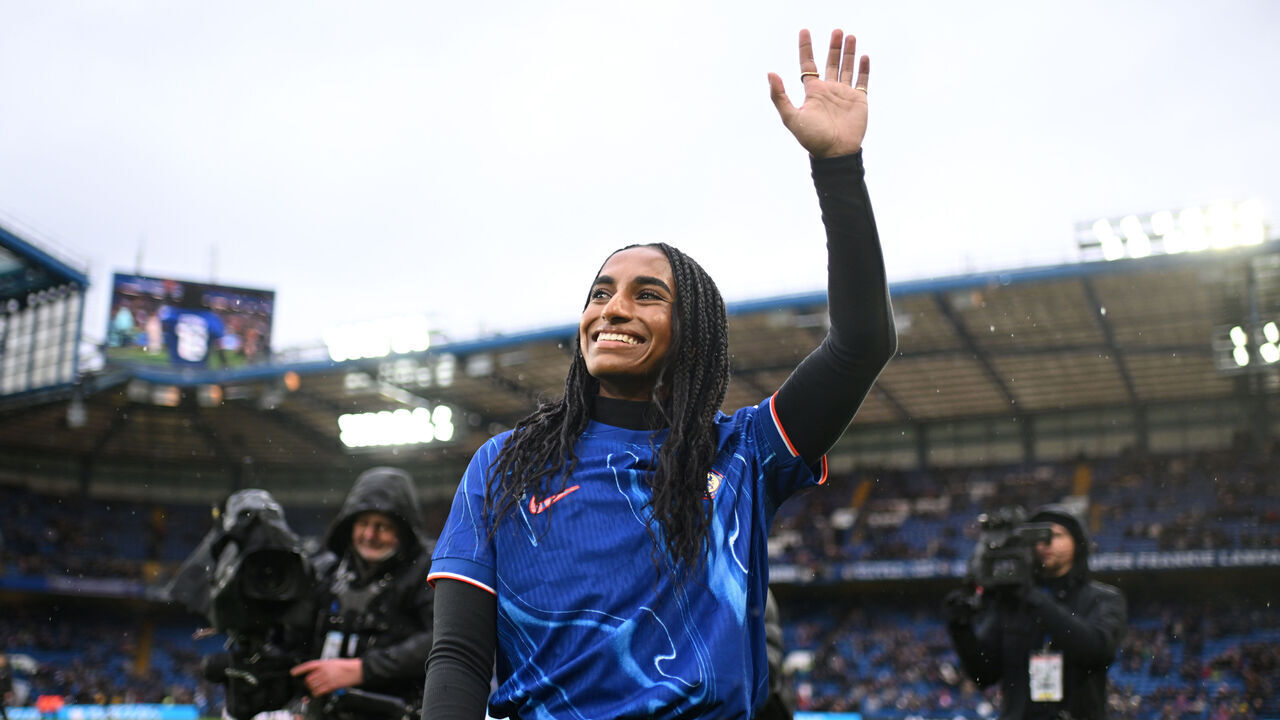 LONDON, ENGLAND - JANUARY 26: Naomi Girma of Chelsea waves to the crowd as she is unveiled as a Chelsea player prior to the Barclays Women's Super League match between Chelsea FC and Arsenal at Stamford Bridge on January 26, 2025 in London, England.