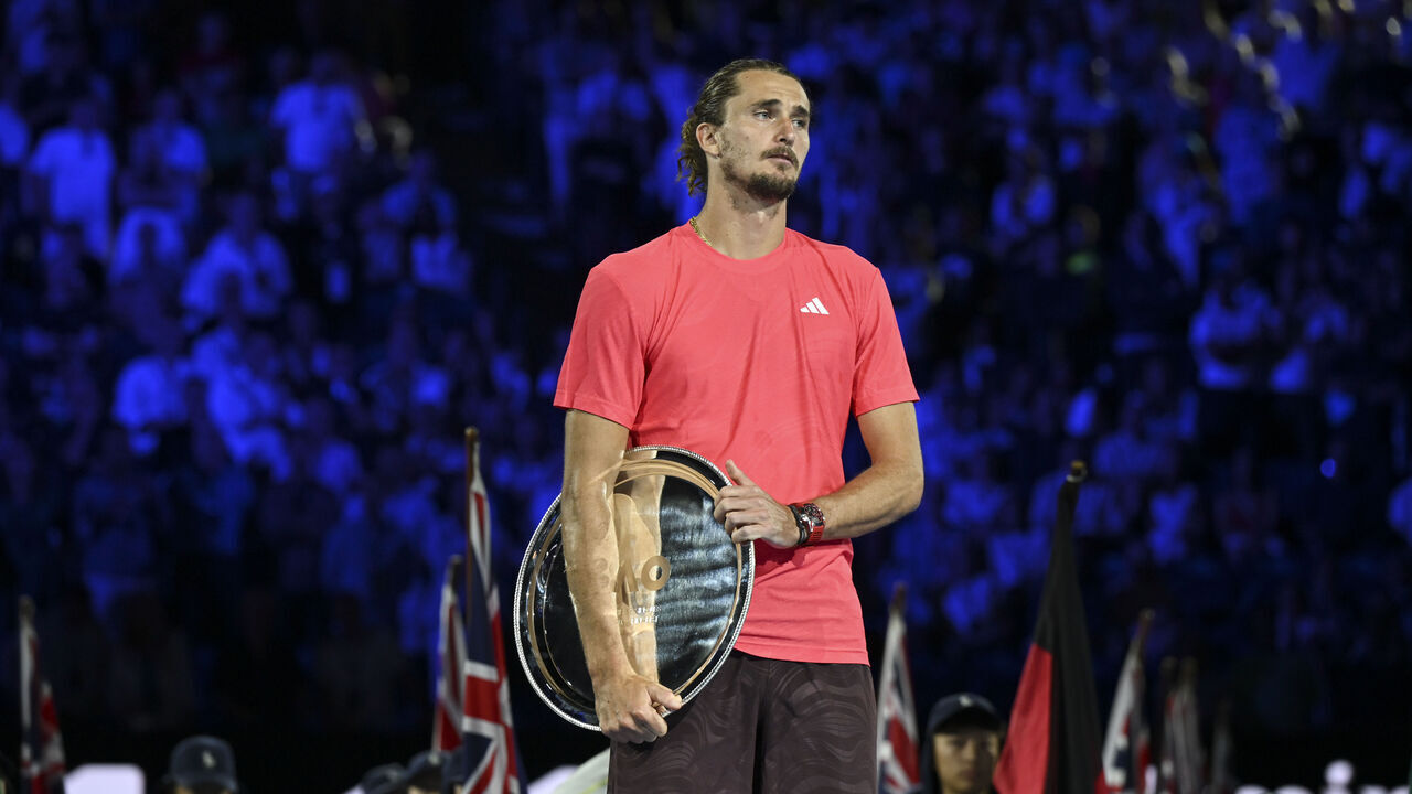 MELBOURNE, AUSTRALIA - JANUARY 26: Alexander Zverev of Germany speaks to crowd during presentations after Jannik Sinner of Italy wins the 2025 Men's Singles Final at the Australian Open grand slam tennis tournament at Melbourne Park in Melbourne, Australia on January 26, 2025