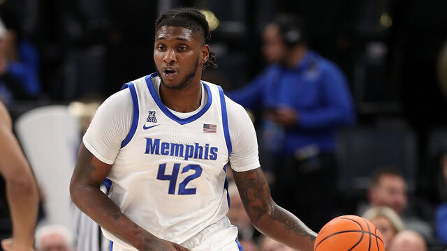 MEMPHIS, TENNESSEE - DECEMBER 04: Dain Dainja #42 of the Memphis Tigers handles the ball during the game against the Louisiana Tech Bulldogs at FedExForum on December 04, 2024 in Memphis, Tennessee.