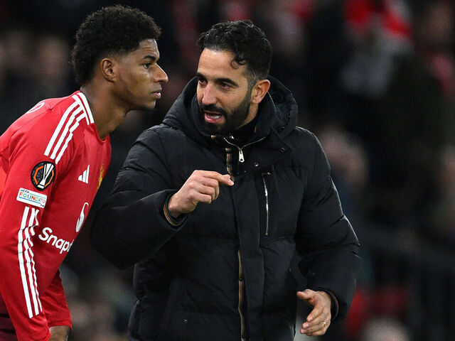MANCHESTER, ENGLAND - NOVEMBER 28: Ruben Amorim, Head Coach of Manchester United, speaks to Marcus Rashford of Manchester United as he prepares to enter the pitch as a substitute during the UEFA Europa League 2024/25 League Phase MD5 match between Manchester United and FK Bodo/Glimt at Old Trafford on November 28, 2024 in Manchester, England.