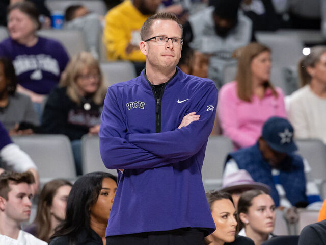 FORT WORTH, TX - DECEMBER 08: TCU head coach Mark Campbell looks on from the sideline during the college basketball game between the TCU Horned Frogs and South Carolina Gamecocks on December 8, 2024 at Dickies Arena in Fort Worth, Texas.