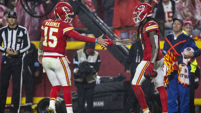 KANSAS CITY, MISSOURI - NOVEMBER 04: DeAndre Hopkins #8 of the Kansas City Chiefs celebrates with his teammate Patrick Mahomes #15 of the Kansas City Chiefs after scoring a touchdown during an NFL Football game against the Tampa Bay Buccaneers at GEHA Field at Arrowhead Stadium on November 04, 2024 in Kansas City, Missouri.