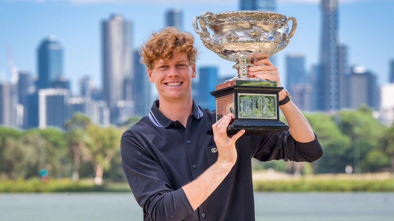 MELBOURNE, AUSTRALIA - JANUARY 27: Jannik Sinner of Italy poses with the Norman Brookes Challenge Cup during the 2025 Australian Open Men's champion media opportunity at Albert Park Lake on January 27, 2025 in Melbourne, Australia. Sinner defeated Alexander Zverev of Germany in last night's Men's Singles Final.