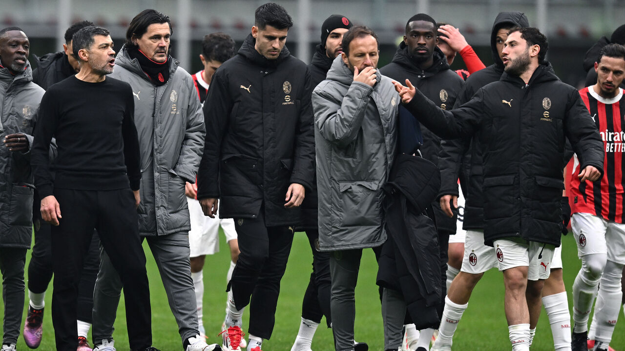 MILAN, ITALY - JANUARY 26: Sergio Conceicao of Milan and Davide Calabria of Milan reacts during the Serie A match between Milan and Parma at Stadio Giuseppe Meazza on January 26, 2025 in Milan, Italy.