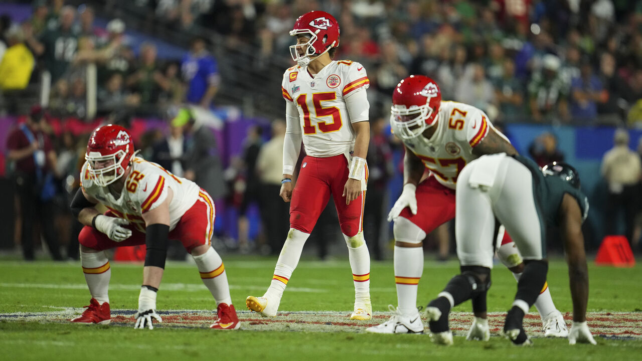 GLENDALE, AZ - FEBRUARY 12: Patrick Mahomes #15 of the Kansas City Chiefs gets set against the Philadelphia Eagles after Super Bowl LVII at State Farm Stadium on February 12, 2023 in Glendale, Arizona. The Chiefs defeated the Eagles 38-35.