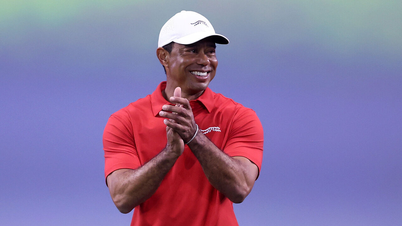 PALM BEACH GARDENS, FLORIDA - JANUARY 14: Tiger Woods of Jupiter Links Golf Club reacts on the seventh green during their TGL presented by SoFi match against the Los Angeles Golf Club at SoFi Center on January 14, 2025 in Palm Beach Gardens, Florida.