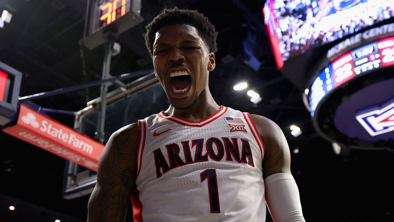 TUCSON, ARIZONA - JANUARY 27: Caleb Love #1 of the Arizona Wildcats reacts to a slam dunk against the Iowa State Cyclones during the first half of the NCAAB game at McKale Center on January 27, 2025 in Tucson, Arizona.