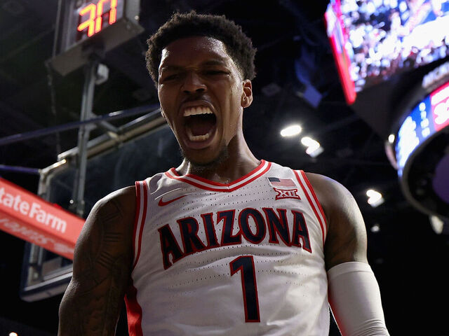 TUCSON, ARIZONA - JANUARY 27: Caleb Love #1 of the Arizona Wildcats reacts to a slam dunk against the Iowa State Cyclones during the first half of the NCAAB game at McKale Center on January 27, 2025 in Tucson, Arizona.