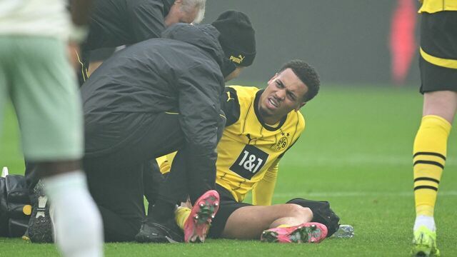 Dortmund's injured German midfielder #08 Felix Nmecha reacts on the pitch during the German first division Bundesliga football match BVB Borussia Dortmund vs Werder Bremen in Dortmund, western Germany, on January 25, 2025.