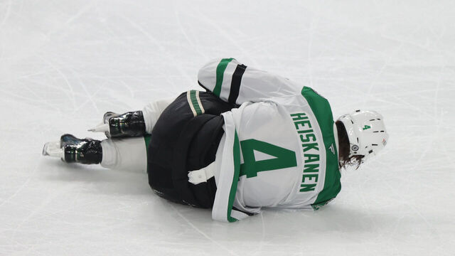 LAS VEGAS, NEVADA - JANUARY 28: Miro Heiskanen #4 of the Dallas Stars reacts after a hit from Mark Stone #61 of the Vegas Golden Knights during the third period at T-Mobile Arena on January 28, 2025 in Las Vegas, Nevada.
