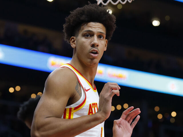 ATLANTA, GEORGIA - DECEMBER 2: Jalen Johnson #1 of the Atlanta Hawks reacts during the fourth quarter against the New Orleans Pelicans at State Farm Arena on December 2, 2024 in Atlanta, Georgia.