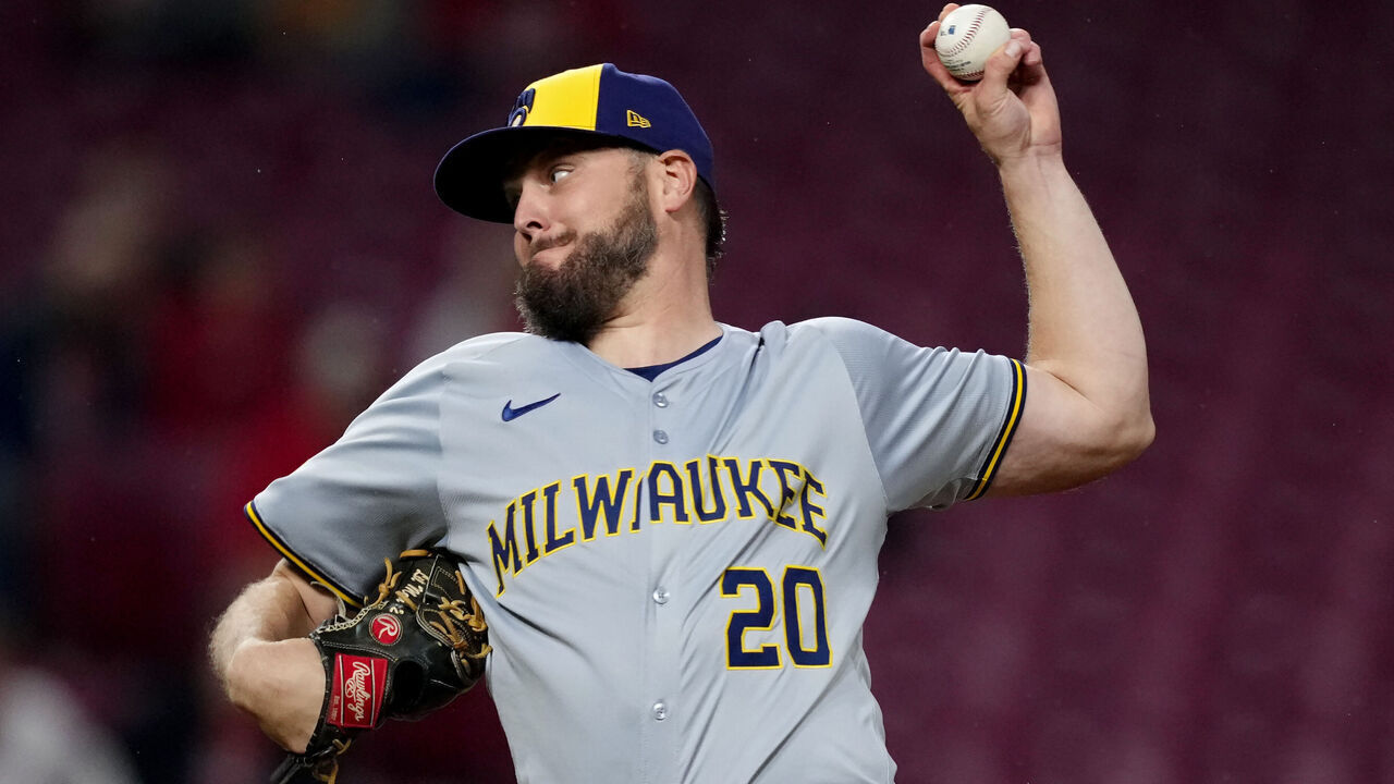 CINCINNATI, OHIO - APRIL 10: Wade Miley #20 of the Milwaukee Brewers pitches in the first inning against the Cincinnati Reds at Great American Ball Park on April 10, 2024 in Cincinnati, Ohio.