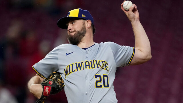 CINCINNATI, OHIO - APRIL 10: Wade Miley #20 of the Milwaukee Brewers pitches in the first inning against the Cincinnati Reds at Great American Ball Park on April 10, 2024 in Cincinnati, Ohio.