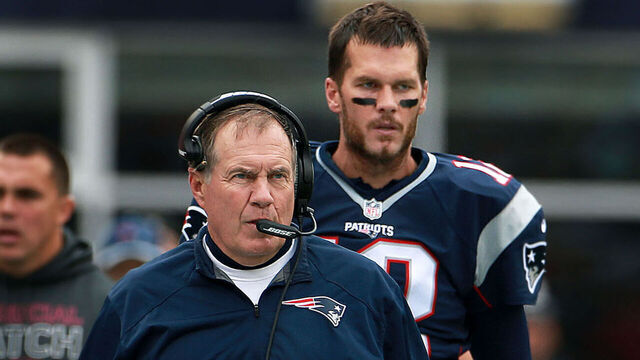 FOXBOROUGH, MA - OCTOBER 25: With only three days off between games, New England Patriots quarterback Tom Brady (rear) and head coach Bill Belichick (front) will have very little time to get ready for Thursday night's game against the Dolphins. Here they are pictured on the sidelines during Sunday's game against the New York Jets in a regular season NFL football game at Gillette Stadium.