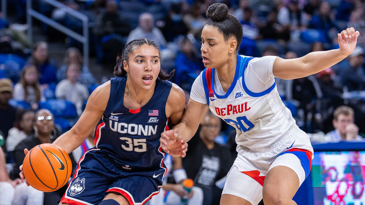 CHICAGO, ILLINOIS - JANUARY 29: Azzi Fudd #35 of the UConn Huskies drives to the basket against Angelina Smith #30 of the DePaul Blue Demons during the first half at Wintrust Arena on January 29, 2025 in Chicago, Illinois.