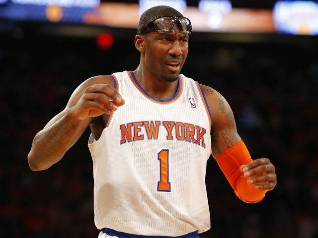 PHOTO: Amar'e Stoudemire bathes in red wine