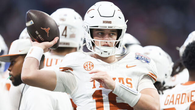 ATLANTA, GEORGIA - JANUARY 1: Arch Manning #16 of the Texas Longhorns warms up during the second half against the Arizona State Sun Devils at Mercedes-Benz Stadium on January 1, 2025 in Atlanta, Georgia.