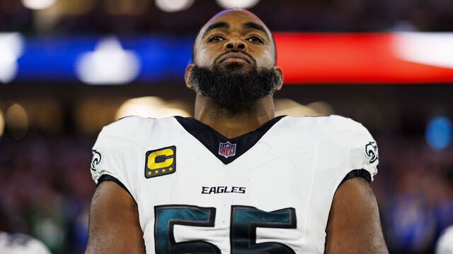 INGLEWOOD, CALIFORNIA - NOVEMBER 24: Defensive end Brandon Graham #55 of the Philadelphia Eagles stands on the sidelines during the national anthem prior to an NFL football game against the Los Angeles Rams, at SoFi Stadium on November 24, 2024 in Inglewood, California.
