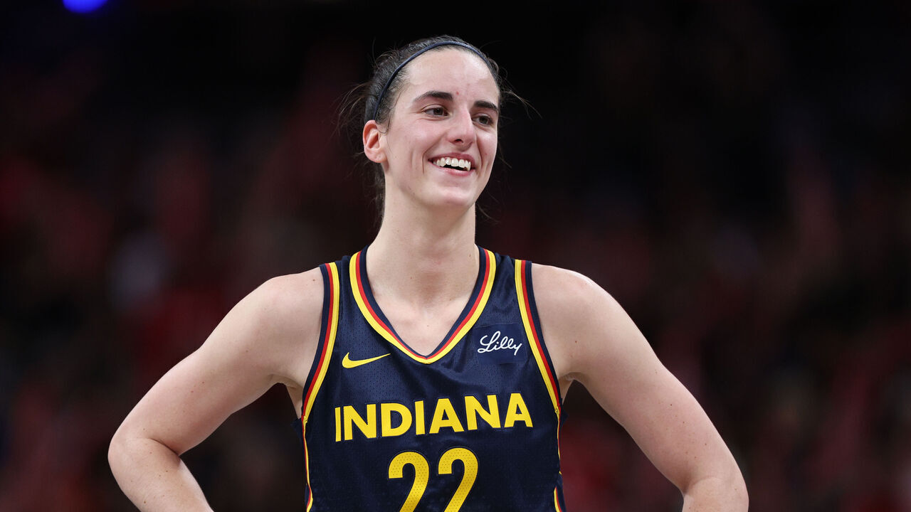 INDIANAPOLIS, IN - SEPTEMBER 15: Caitlin Clark #22 of the Indiana Fever smiles during the game against the Dallas Wings on September 15, 2024 at Gainbridge Fieldhouse in Indianapolis, Indiana. Mandatory Copyright Notice: Copyright 2024 NBAE