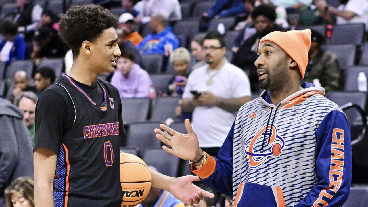 Sacramento, Ca - March 09: Former NBA player Gilbert Arenas talks with his son Alijah Arenas of Chatsworth at halftime against Monterey during a CIF State Division IV boys basketball championship game at the Golden 1 Center in Sacramento on Saturday, March 9, 2024.