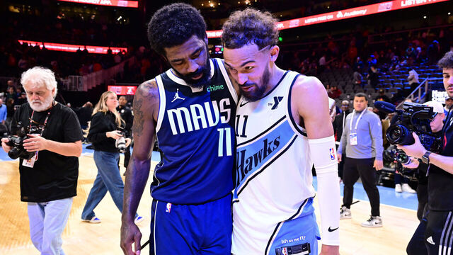 ATLANTA, GA - NOVEMBER 25: Kyrie Irving #11 of the Dallas Mavericks and Trae Young #11 of the Atlanta Hawks embrace after the game on November 25, 2024 at State Farm Arena in Atlanta, Georgia. NOTE TO USER: User expressly acknowledges and agrees that, by downloading and/or using this Photograph, user is consenting to the terms and conditions of the Getty Images License Agreement. Mandatory Copyright Notice: Copyright 2024 NBAE
