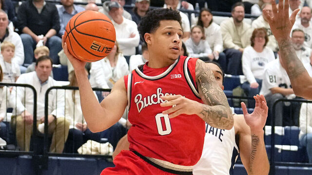 UNIVERSITY PARK, PA - JANUARY 30: John Mobley Jr. #0 of the Ohio State Buckeyes keeps the ball in bounds form Nick Kern Jr. #3 of the Penn State Nittany Lions in the first half during a college basketball game at Rec Hall on January 30, 2025 in University Park, Pennsylvania.