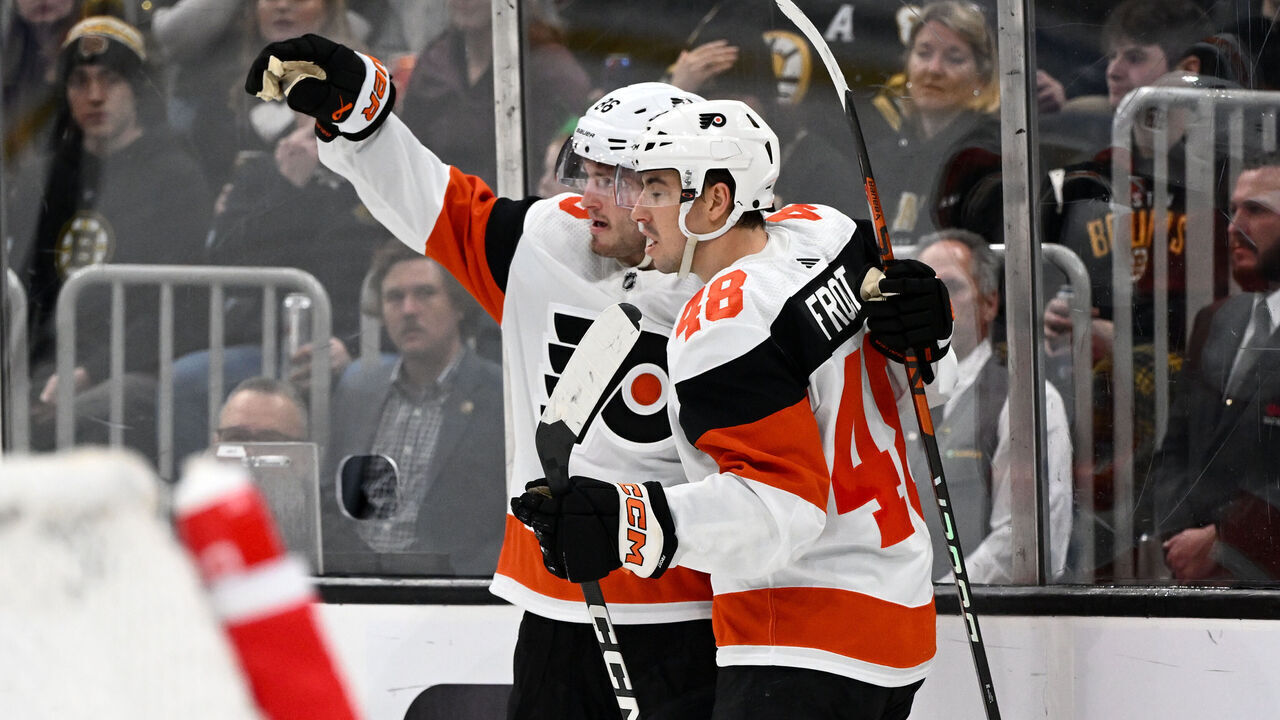 BOSTON, MASSACHUSETTS - MARCH 16: Joel Farabee #86 of the Philadelphia Flyers celebrates with Morgan Frost #48 after scoring a goal against the Boston Bruins during the second period at the TD Garden on March 16, 2024 in Boston, Massachusetts.
