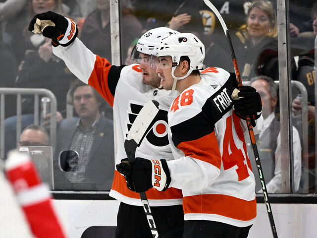 BOSTON, MASSACHUSETTS - MARCH 16: Joel Farabee #86 of the Philadelphia Flyers celebrates with Morgan Frost #48 after scoring a goal against the Boston Bruins during the second period at the TD Garden on March 16, 2024 in Boston, Massachusetts.