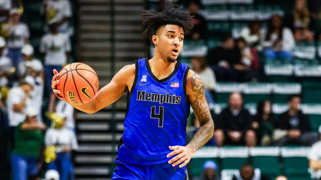 CHARLOTTE, NORTH CAROLINA - JANUARY 19: PJ Haggerty #4 of the Memphis Tigers brings the ball down the court during the first half of a basketball game against the Charlotte 49ers at Dale F. Halton Arena on January 19, 2025 in Charlotte, North Carolina.