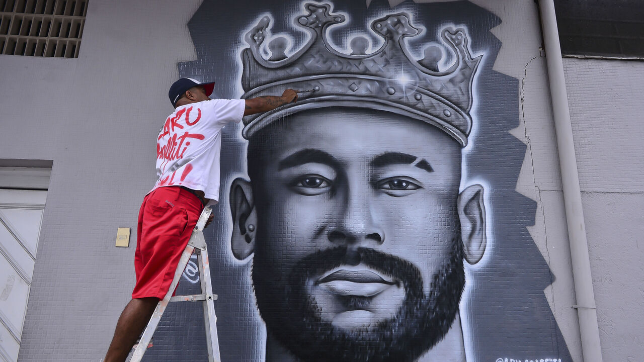 SANTOS, BRAZIL - JANUARY 31: A mural is being painted of Neymar Jr. ahead of his unveiling as the new player of Santos at Urbano Caldeira Stadium (Vila Belmiro) on January 31, 2025 in Santos, Brazil. The Brazilian striker returns to his boyhood club, 12 years after he first left to join Barcelona.
