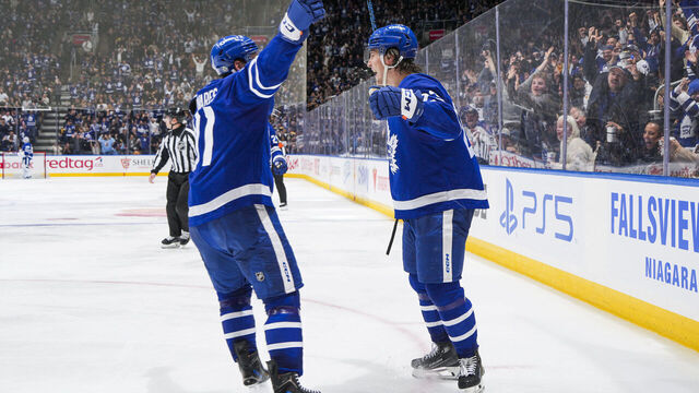 TORONTO, ON - JANUARY 4: Matthew Knies #23 celebrates scoring a goal with John Tavares #91 of the Toronto Maple Leafs during the third period against the Boston Bruins at the Scotiabank Arena on January 4, 2025 in Toronto, Ontario, Canada.