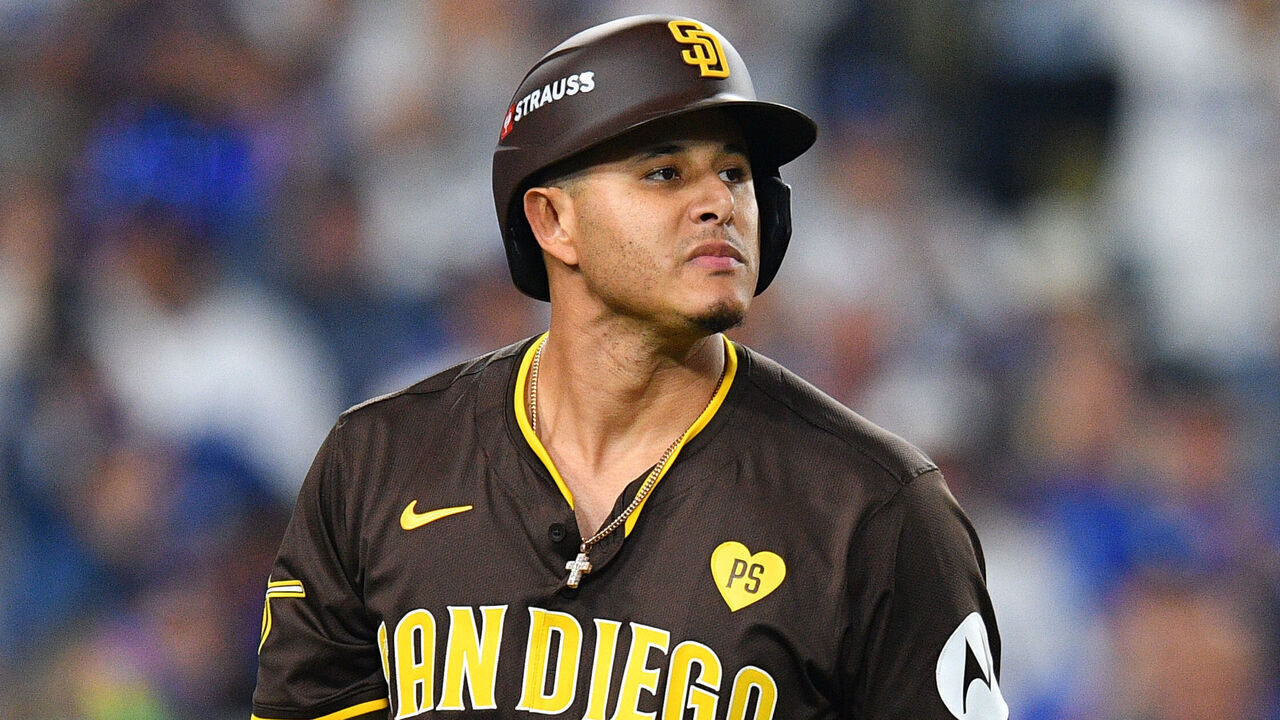 LOS ANGELES, CA - OCTOBER 11: San Diego Padres third baseman Manny Machado (13) walks back to the dugout after striking out during game five of the National League Division Series game between the San Diego Padres and the Los Angeles Dodgers on October 11, 2024 at Dodger Stadium in Los Angeles, CA.