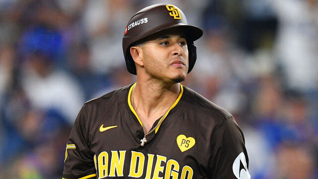 LOS ANGELES, CA - OCTOBER 11: San Diego Padres third baseman Manny Machado (13) walks back to the dugout after striking out during game five of the National League Division Series game between the San Diego Padres and the Los Angeles Dodgers on October 11, 2024 at Dodger Stadium in Los Angeles, CA.