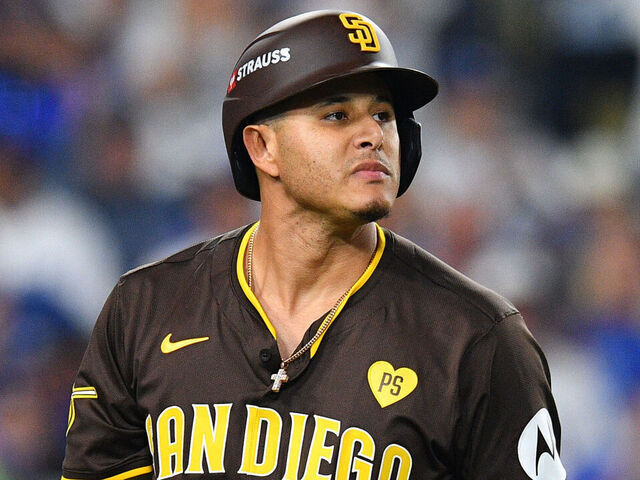 LOS ANGELES, CA - OCTOBER 11: San Diego Padres third baseman Manny Machado (13) walks back to the dugout after striking out during game five of the National League Division Series game between the San Diego Padres and the Los Angeles Dodgers on October 11, 2024 at Dodger Stadium in Los Angeles, CA.