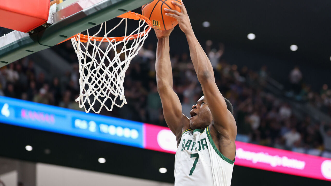 WACO, TX - FEBRUARY 01: Baylor Bears guard VJ Edgecombe (7) dunks the ball during the Big 12 college basketball game between Baylor Bears and Kansas Jayhawks on February 1, 2025, at Foster Pavilion in Waco, Texas.