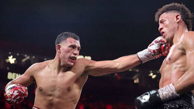 LAS VEGAS, NEVADA - FEBRUARY 01: WBC interim light heavyweight champion David Benavidez (L) punches WBA light heavyweight champion David Morrell Jr. during the 12th round of a title fight at T-Mobile Arena on February 01, 2025 in Las Vegas, Nevada. Benavidez won the WBA title by unanimous decision.