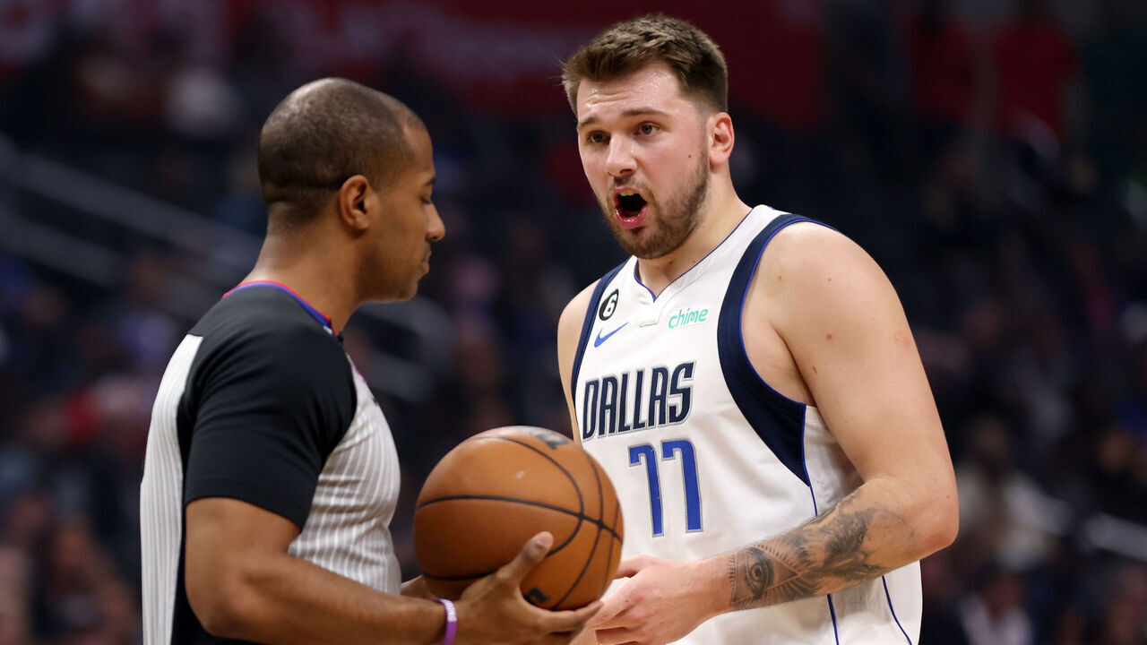 LOS ANGELES, CALIFORNIA - JANUARY 10: Luka Doncic #77 of the Dallas Mavericks argues with referee John Butler #30 during the first quarter against the Los Angeles Clippers at Crypto.com Arena on January 10, 2023 in Los Angeles, California.