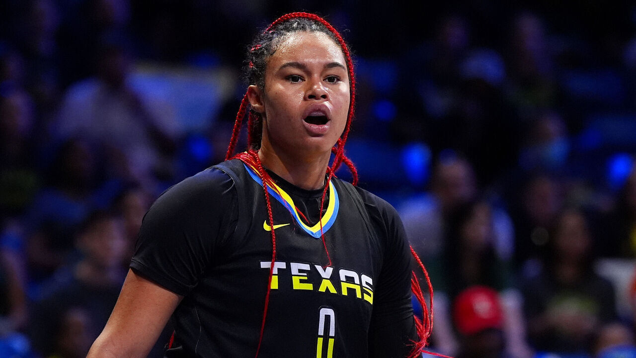 ARLINGTON, TEXAS - SEPTEMBER 13: Satou Sabally #0 of the Dallas Wings reacts during the second half against the Seattle Storm at College Park Center on September 13, 2024 in Arlington, Texas.