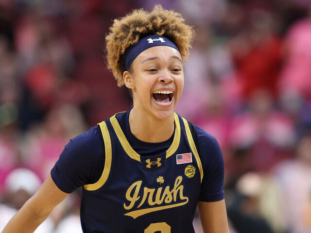 LOUISVILLE, KENTUCKY - FEBRUARY 02: Hannah Hidalgo #3 of the Notre Dame Fighting Irish celebrates in the first half against the Louisville Cardinals at KFC YUM! Center on February 02, 2025 in Louisville, Kentucky.