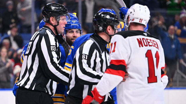 BUFFALO, NY - FEBRUARY 2: Jason Zucker #17 of the Buffalo Sabres exchanges words with Stefan Noesen #11 of the New Jersey Devils after scoring a second period goal during an NHL game on February 2, 2025 at KeyBank Center in Buffalo, New York.