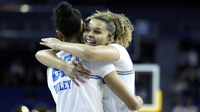 LOS ANGELES, CALIFORNIA - FEBRUARY 02: (L-R) Kendall Dudley #22 and Avary Cain #2 of the UCLA Bruins celebrate a 79-53 win against the Minnesota Golden Gophers in the second half at UCLA Pauley Pavilion on February 02, 2025 in Los Angeles, California.