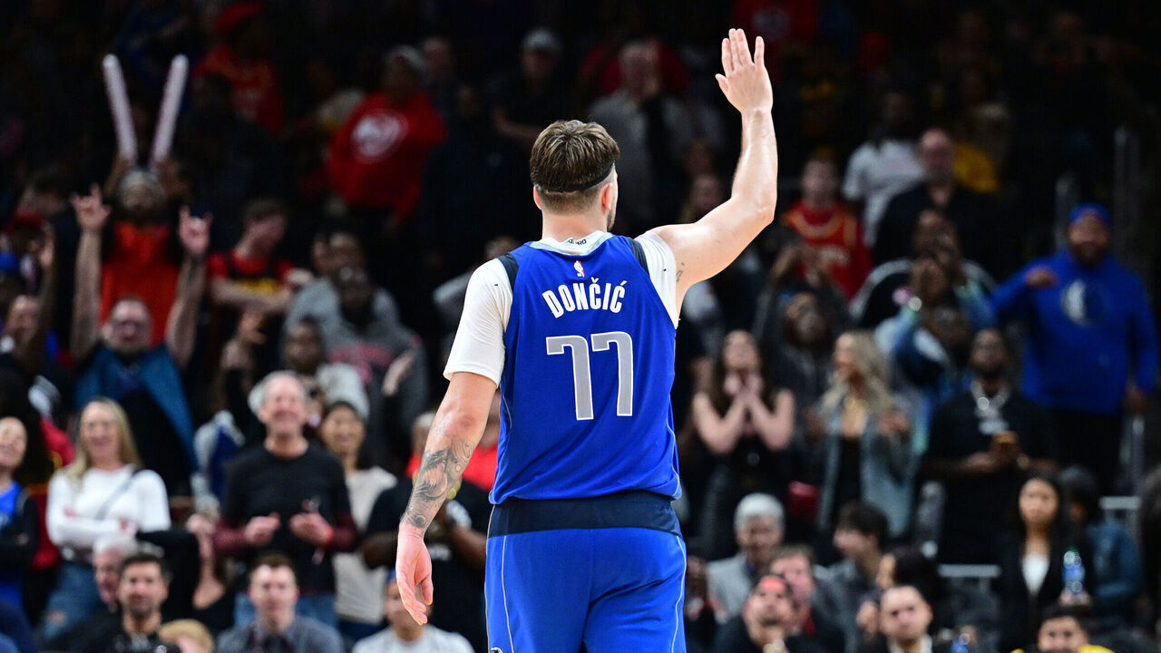 ATLANTA, GA - JANUARY 26: Luka Doncic #77 of the Dallas Mavericks waves to fans during the game against the Atlanta Hawks on January 26, 2024 at State Farm Arena in Atlanta, Georgia. NOTE TO USER: User expressly acknowledges and agrees that, by downloading and/or using this Photograph, user is consenting to the terms and conditions of the Getty Images License Agreement. Mandatory Copyright Notice: Copyright 2024 NBAE