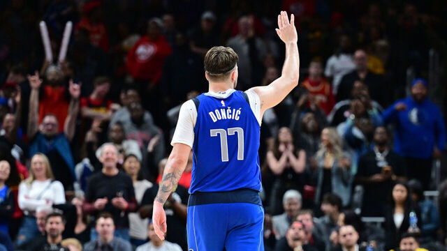 ATLANTA, GA - JANUARY 26: Luka Doncic #77 of the Dallas Mavericks waves to fans during the game against the Atlanta Hawks on January 26, 2024 at State Farm Arena in Atlanta, Georgia. NOTE TO USER: User expressly acknowledges and agrees that, by downloading and/or using this Photograph, user is consenting to the terms and conditions of the Getty Images License Agreement. Mandatory Copyright Notice: Copyright 2024 NBAE