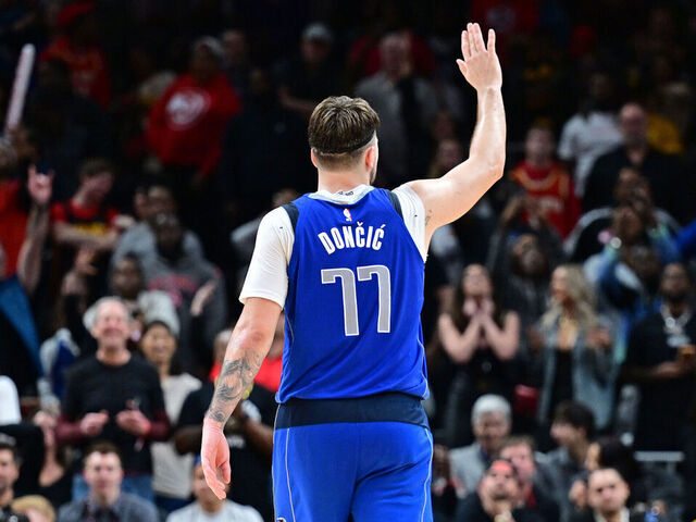 ATLANTA, GA - JANUARY 26: Luka Doncic #77 of the Dallas Mavericks waves to fans during the game against the Atlanta Hawks on January 26, 2024 at State Farm Arena in Atlanta, Georgia. NOTE TO USER: User expressly acknowledges and agrees that, by downloading and/or using this Photograph, user is consenting to the terms and conditions of the Getty Images License Agreement. Mandatory Copyright Notice: Copyright 2024 NBAE